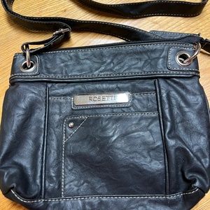 Women's vinyl Rosetti black shoulder bag, size 10 1/2" X  2 1/2"W X 9" H